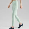 Obcisłe legginsy sportowe „Green Black Teal”