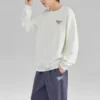Sweter z nadrukiem literowym „White Gold”